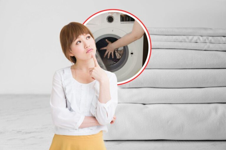 donna che pensa a quando lavare le lenzuola in lavatrice